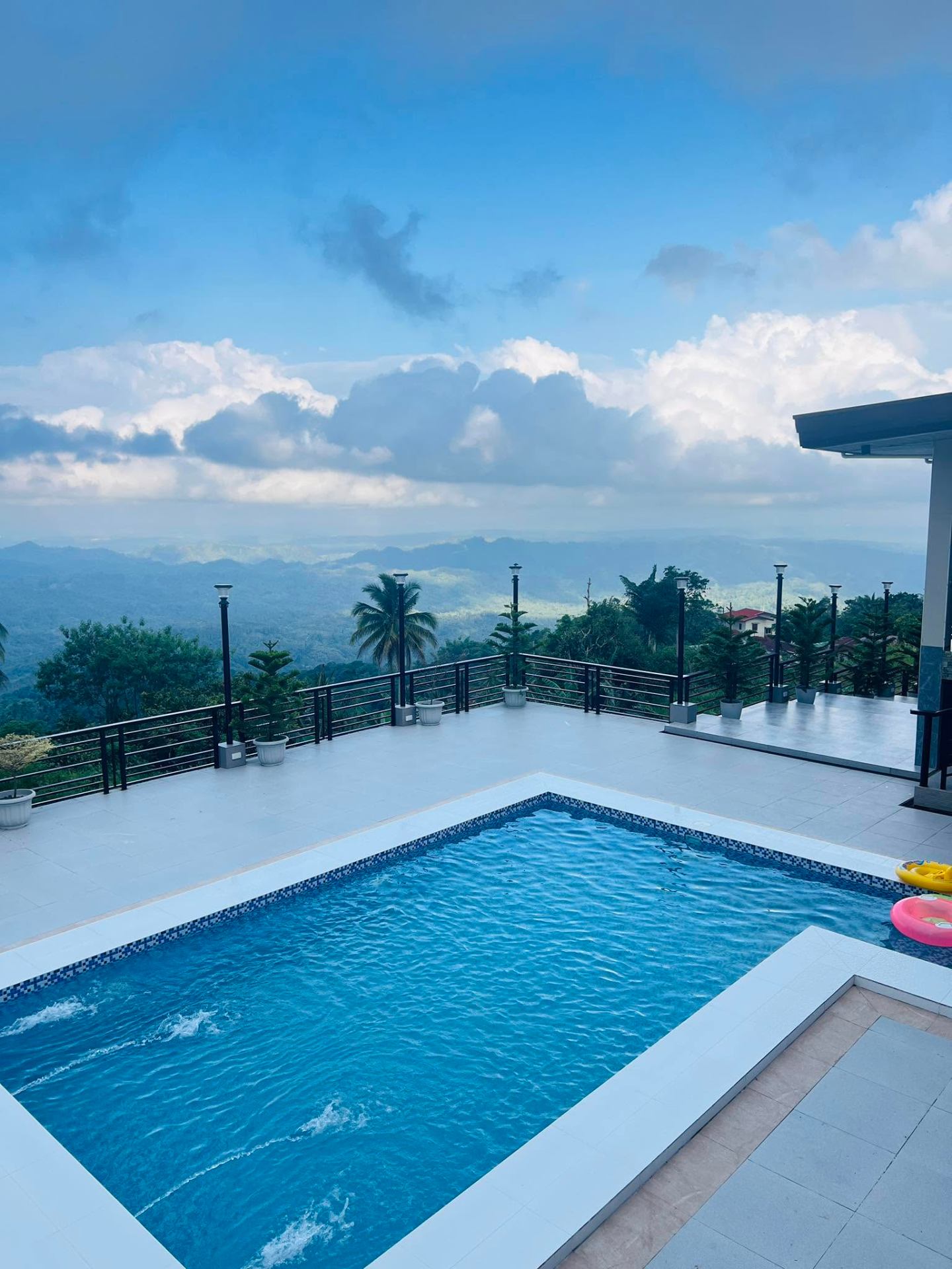 Swimming pool with mountain view during the day